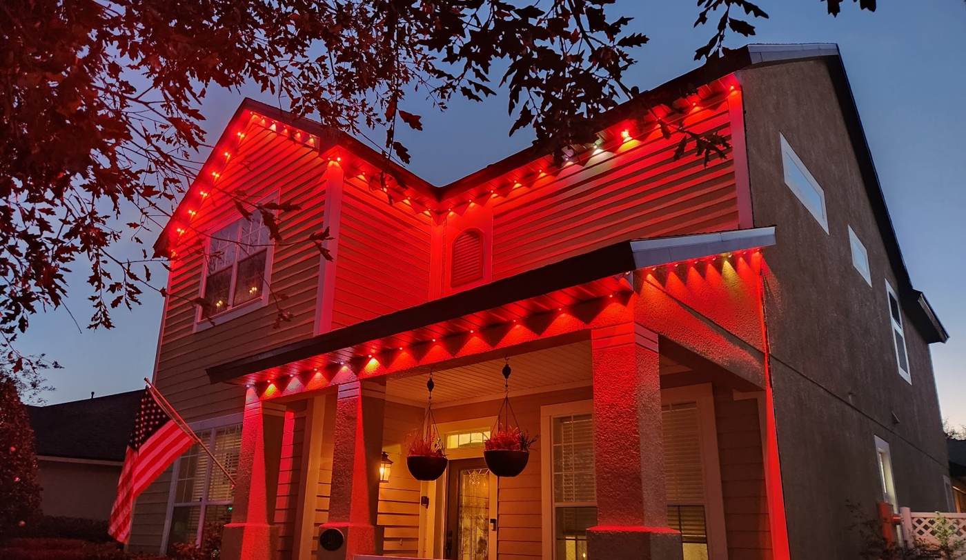 Same home glowing all red at dusk