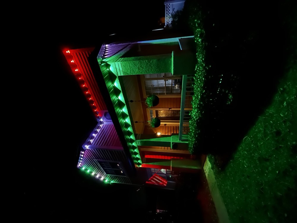Ranch home glowing solid red for game day