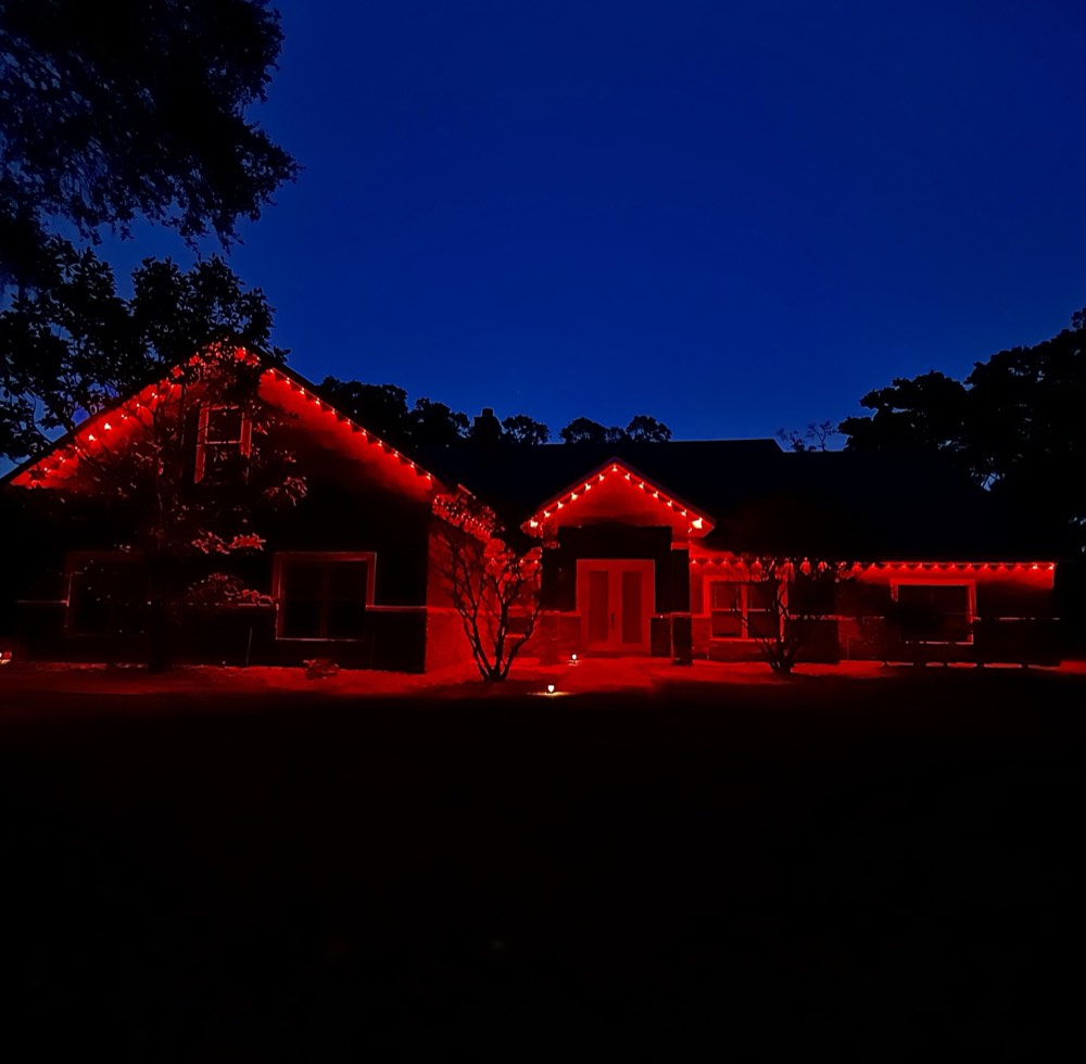 Ranch home in red, green and gold Christmas colors